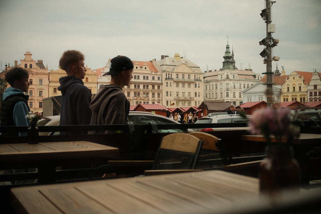 Slow Travel in Europe with a relaxed traveler by a train window and a calm city street