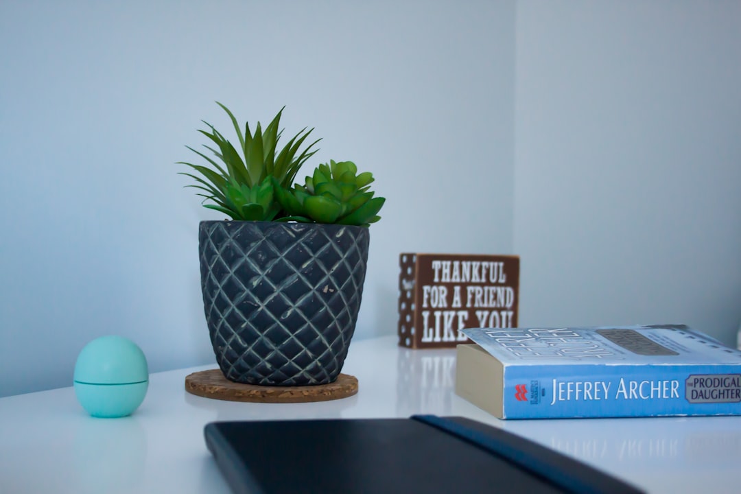 Evening reset routine with a notebook, lamp, and tidy desk